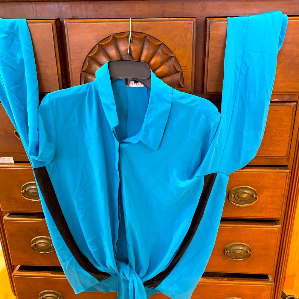 Large tie front blouse.  Beautiful Turquoise with black strips on sides.